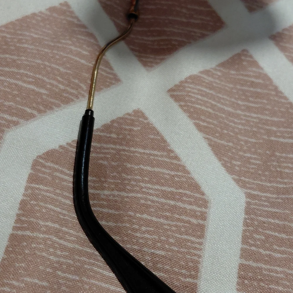 Miu Miu Gold Frame Sunglasses with Black Lenses